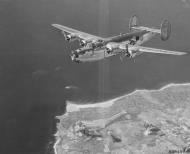 Asisbiz 44 41159 B 24J Liberator 15AF 465BG782BS P leaving the drop zone SOuthern France 12th Aug 1944 01