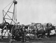 Asisbiz 41 29350 B 24H Liberator 8AF 466BG785BS 2UW getting a new 3 engine after the 27th May 1944 mission 01