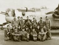 Asisbiz 42 50791 B 24J Liberator 8AF 466BG787BS 6LB Judy Sue with crew and nose art left side England 01