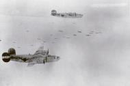 Asisbiz 44 40232 B 24J Liberators 8AF 491BG855BS V2B+ and 491BG853BS T8 W over Hanau Germany 11th Dec 1944