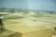 Asisbiz Consolidated B 24J Liberators 8AF 491BG fly low over the English countryside 24th Mar 1945 FRE6881