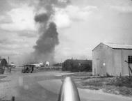 Asisbiz USAAF 491BG B 24 Liberator base at Metfield when a bomb dump explosion occured FRE2120