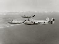 Asisbiz 44 40647 B 24J Liberator 7AF 494BG867BS 647 Lady Kaye practise formation over Kauai Hawaii 14th Oct 1944 01