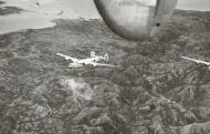 Asisbiz 44 40705 B 24J Liberator 7AF 494BG865BS 705 The Sniffin Griffin in formation over Cebu Philippines 01