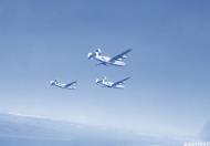 Asisbiz 44 40760 B 24J Liberator 7AF 494BG867BS 760 Black Sheep in formation over Angaur Island Caroline Isls Oct 1944 NA1204