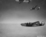 Asisbiz 42 100294 B 24J Liberator 8AF 93BG328BS GOB Victory Belle in formation 27th Nov 1944 01