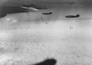 Asisbiz Consolidated B 24 Liberators 8AF 93BG drop their bombs over Ingolstadt Germany 1st Mar 1945 01