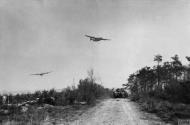 Asisbiz Consolidated B 24 Liberators 8AF 93BG fly low over British tank column in the Rhine to drop supplies 24th Mar 1945 FRE14250