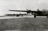 Asisbiz Consolidated B 24 Liberators 8AF 93BG line up for take off to fly the Atlantic from Anglesey N Wales May 1945 FRE3754