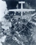 Asisbiz Far Eastern Air Force B 24 Liberators bomb town of Ambon on the Island of Ceram Sep 1944 NA418