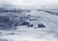 Asisbiz USAAF airbase at Angaur Island Caroline Islands with 5AF 22BG B 24 Liberators lined up on the strip 9th Dec 1944 NA115