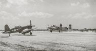 Asisbiz 43 28148 B 25J Mitchell 7AF 41BG landing at Iwo Jima a USMC F4U 4 Corsair White 226 waits 1945 01