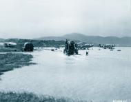 Asisbiz 41 7226 P 39F Airacobra 53FG13FS White 16 after heavy rains at Longview Adak Island 7th Aug 1942 NA076