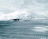 Asisbiz B 25D Mitchell 11AF 28BG Yellow 83 takes off from Alexai Point Air Base On Attu Aleutian Islands 1943 NA1117