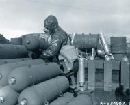 Asisbiz USAAF chemical sulphur trioxide bombs being stacked on a base Aleutian Island 1943 NA1251