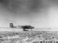 Asisbiz 42 32490 B 25C Mitchell 12AF 310BG landing back at their base after a 500 plane mission 8th Aug 1943 01