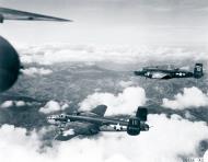 Asisbiz 43 3522 B 25D Mitchell 12AF 321BG447BS Hunky Dorey enroute to bomb Nazi ground installations NA2842