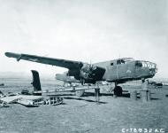 Asisbiz B 25C Mitchell 9AF 12AF 12BG Cobra noseart being salvaged Berteaux area 4th Feb 1943 NA664