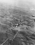 Asisbiz Target 12AF 321BG B 25s bomb enemy gun positions for the Fifth Army front near Cassino Italy 3rd Jan 1944 02