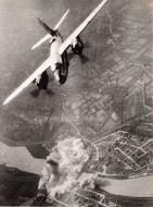 Asisbiz USAAF B 26 Marauder Bomb strike bridge over Legnano in Northern Italy 01