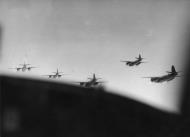 Asisbiz USAAF B 26 Marauders 9AF 322BG fly in formation during a mission over France FRE4550