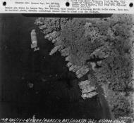 Asisbiz USAAF B 26B Marauder 5AF bombing Barges in Borgen Bay New Britain note shadows of attacking B 26s above Nov 1943 01