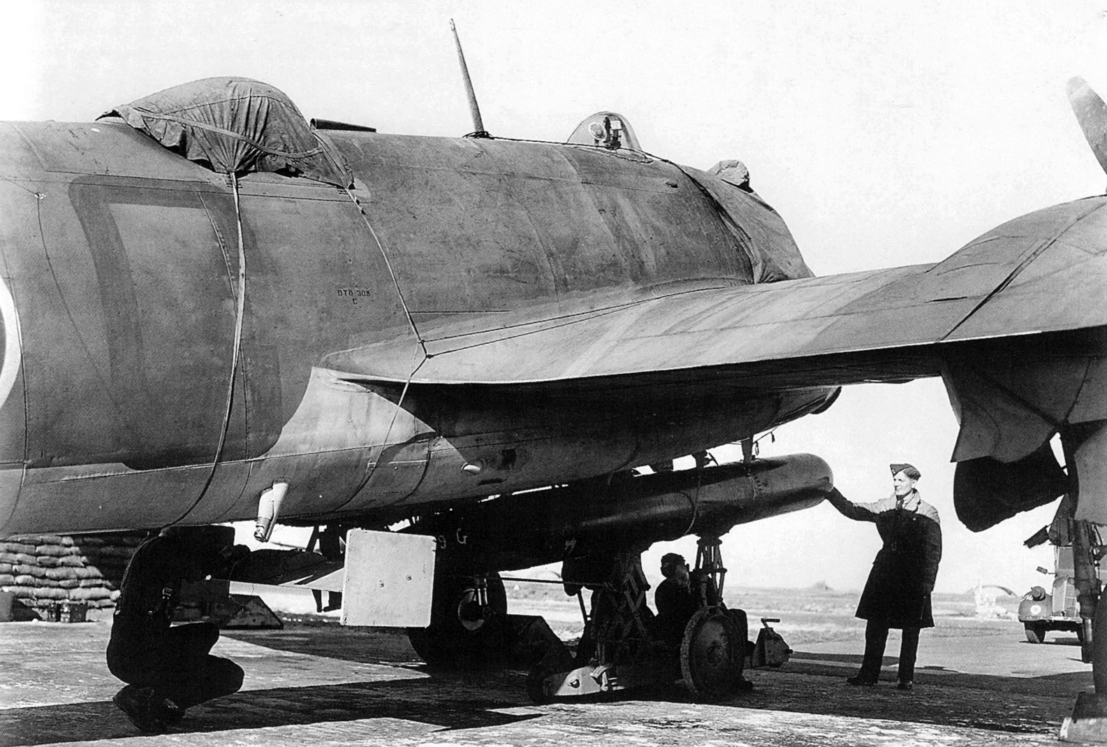 Asisbiz Beaufighter X RCAF 441Sqn 9GC being rearmed with a torpedo IWM ...