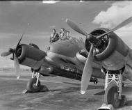 Asisbiz Beaufighter VIC (ITF) RAF 144Sqn crew stand by the cockpit of their aircraft at Tain Ross shire IWM CH9765