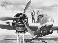 Asisbiz Beaufighter VIC (ITF) RAF 144Sqn crew stand by the cockpit of their aircraft at Tain Ross shire IWM CH9765a