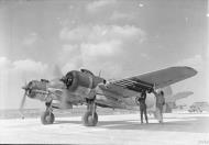 Asisbiz Beaufighter X RCAF 404Sqn 2G being fitted with 3 inch 25lb rockets at Davidstow Moor Cornwall IWM CH13180