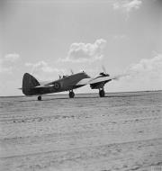 Asisbiz Beaufighter IC RAF 252Sqn F T5137 taking off at El Magrun Libya 1942 IWM CM4422