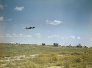 Asisbiz Bristol Beaufighter IF RAF 272Sqn circles a desert airfield Libya IWM TR851