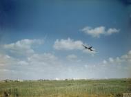 Asisbiz Bristol Beaufighter IF RAF 272Sqn circles a desert airfield Libya IWM TR853