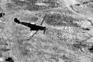 Asisbiz Messerschmitt Bf 109E7Trop 1.JG27 White 3 on low level patrol over Libya Feb 1942 03