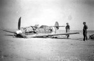 Asisbiz Messerschmitt Bf 109E7Trop 1.JG27 White 4 force landed North Africa 1942 01