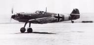 Asisbiz Messerschmitt Bf 109E7Trop 1.JG27 White 6 taking off El Gazala Libya 1941 01