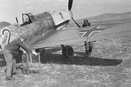Asisbiz Messerschmitt Bf 109E7 5.JG27 Black 12 dash being refueled Sofia Vrba April 1941 02