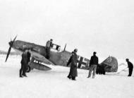 Asisbiz Ostfront Messerschmitt Bf 109E7R3 5.JG27 Red 4 being prepared for take off winter 1941 01