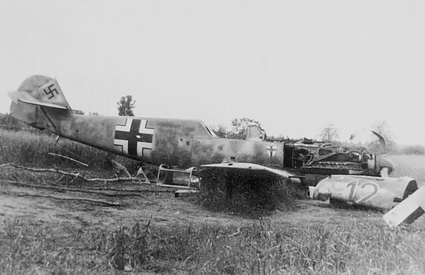 Asisbiz Messerschmitt Bf 109E 8.JG27 Black 12 belly landed Balkans 04