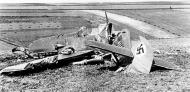 Asisbiz Messerschmitt Bf 109E1 D IWKU with its back broken and pilot recovering on the wing 01