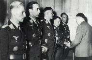 Asisbiz Aircrew Luftwaffe pilots Schnaufer Hitler Hartman receiving Knights Cross Oak Leaves 01