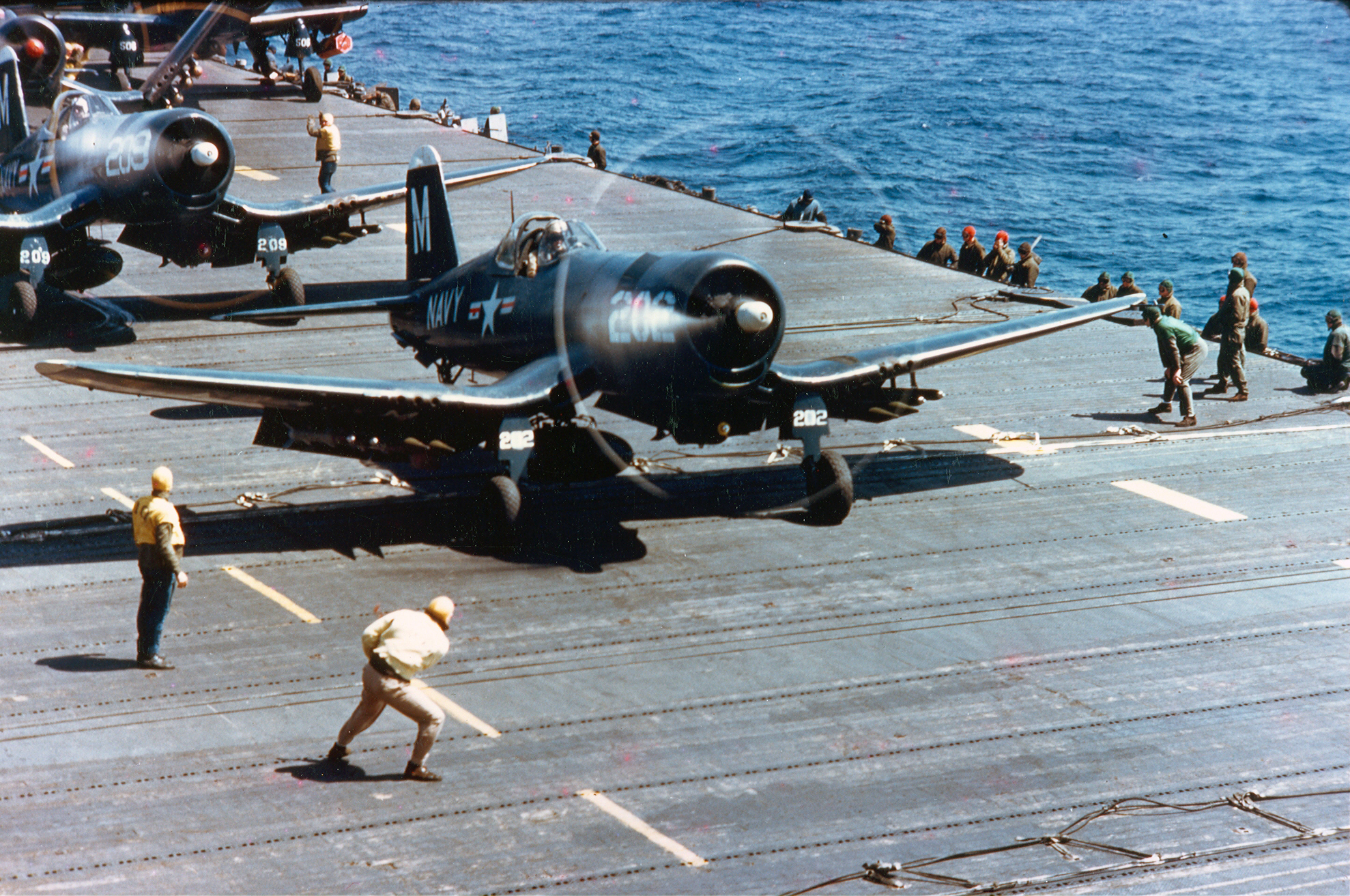 Asisbiz Vought F4U 4 Corsair VF-63 White M202 and M209 preparing for ...