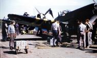 Asisbiz French Navy Vought F4U 7 Corsairs being prepared for Operation Mousquetaire 1956 01