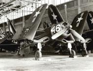 Asisbiz Goodyear FG 1D Corsair MARTU White E46 BuNo 92623 E31 and E35 hangared at NAS Minneapolis MN circa 1955 01