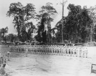 Asisbiz VF 17 LtCmd John T Blackburn (front) receives the distinguished flying cross from MajGen Ralph J Mitchell 1944 01