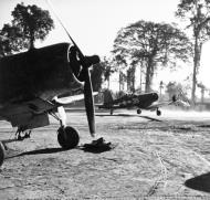 Asisbiz Vought F4U 1A Corsair VF 17 Jolly Rogers White 35 taxing Piva Strip Bougainville raid on Rabaul Feb 1944 80 G 425511