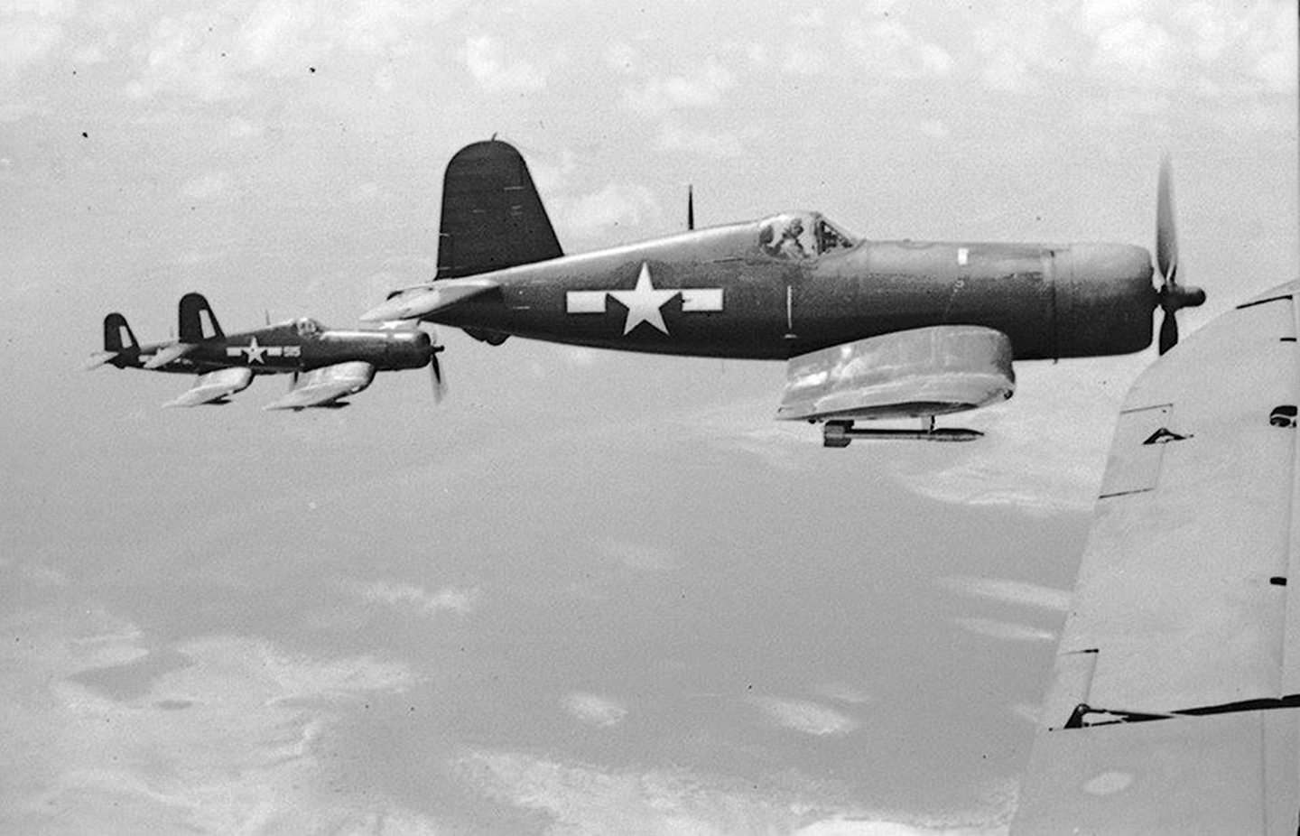 Asisbiz Vought AU 1 Corsair VMF 122 on patrol over Palau Islands 1945-02