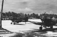 Asisbiz Goodyear FG 1D Corsair VMF 155 White 157 and 161 taxing at Kwajalein Atoll Marshall Islands 1945 01