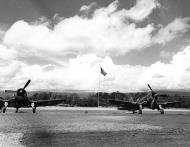 Asisbiz Vought F4U 1 Corsairs VMF 213 White 5 and 9 at Strip No 1 Henderson Field Guadalcanal 1943 01