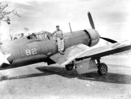 Asisbiz Aircrew USMC 2nd Lt HS Huidekoper from VMF 213 next to a old VMF 216 F4U 1 Corsair White 82 Munda 1943 01